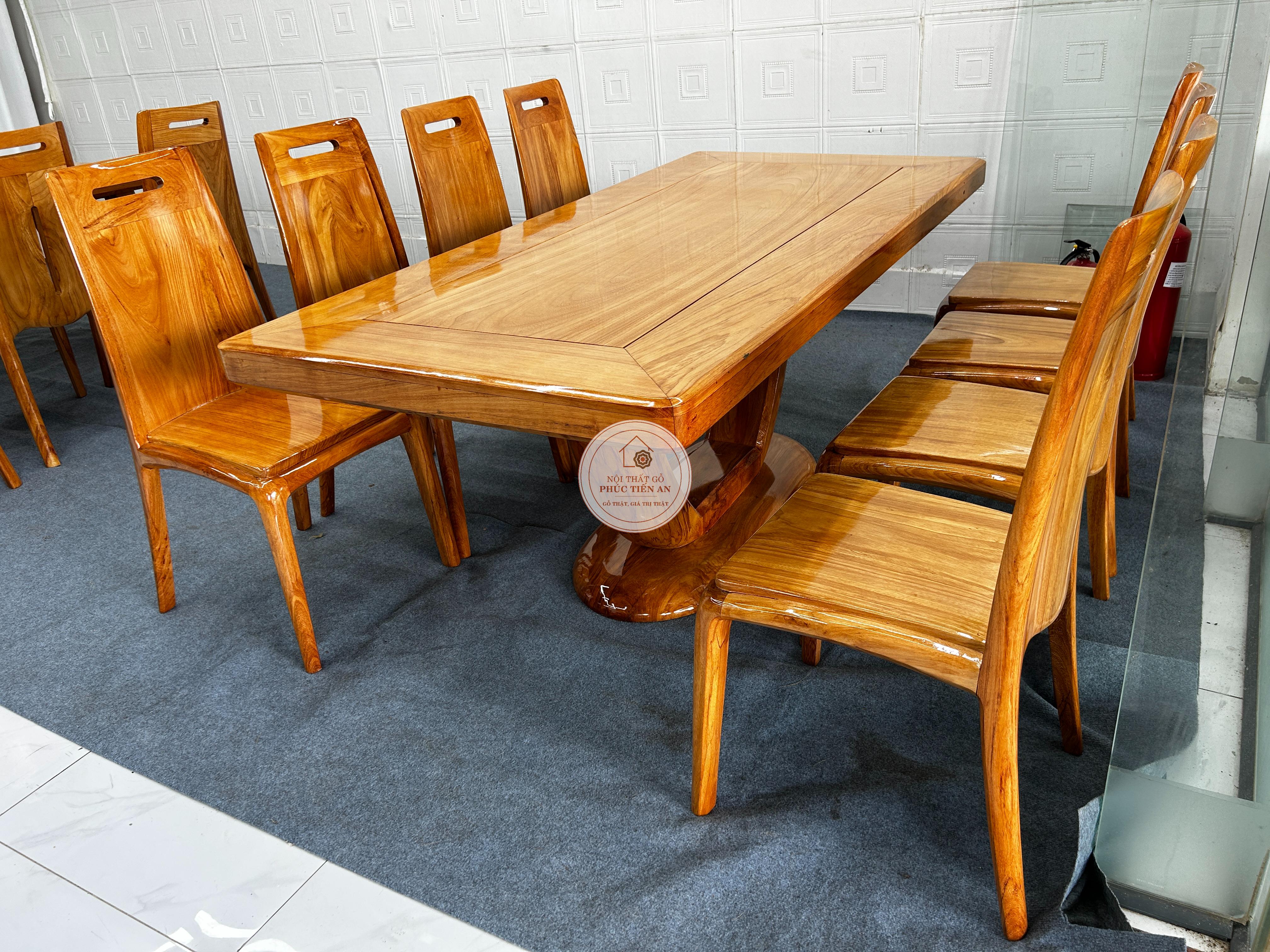 Bàn ăn gỗ cao cấp - Bàn ăn gõ chân trứng 8 ghế SF1